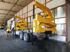 SINOTRUK HOWO 8x4 Side Crane Truck for Transporting 20ft Container